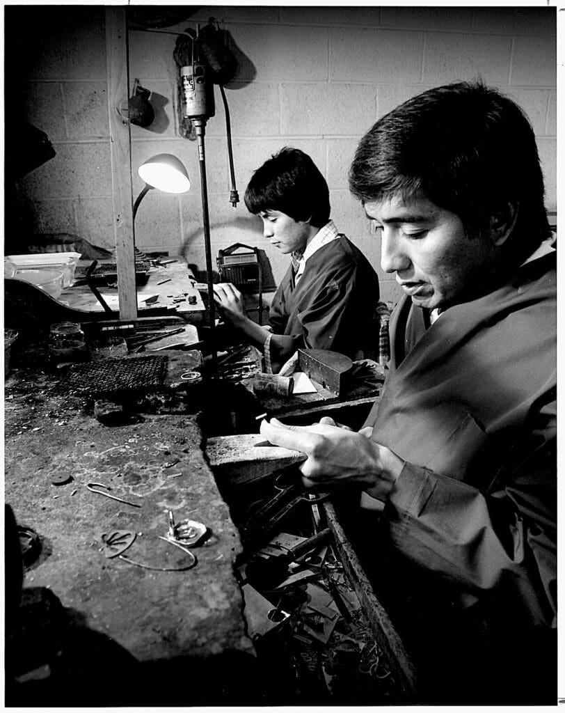 Two men working in a workshop.