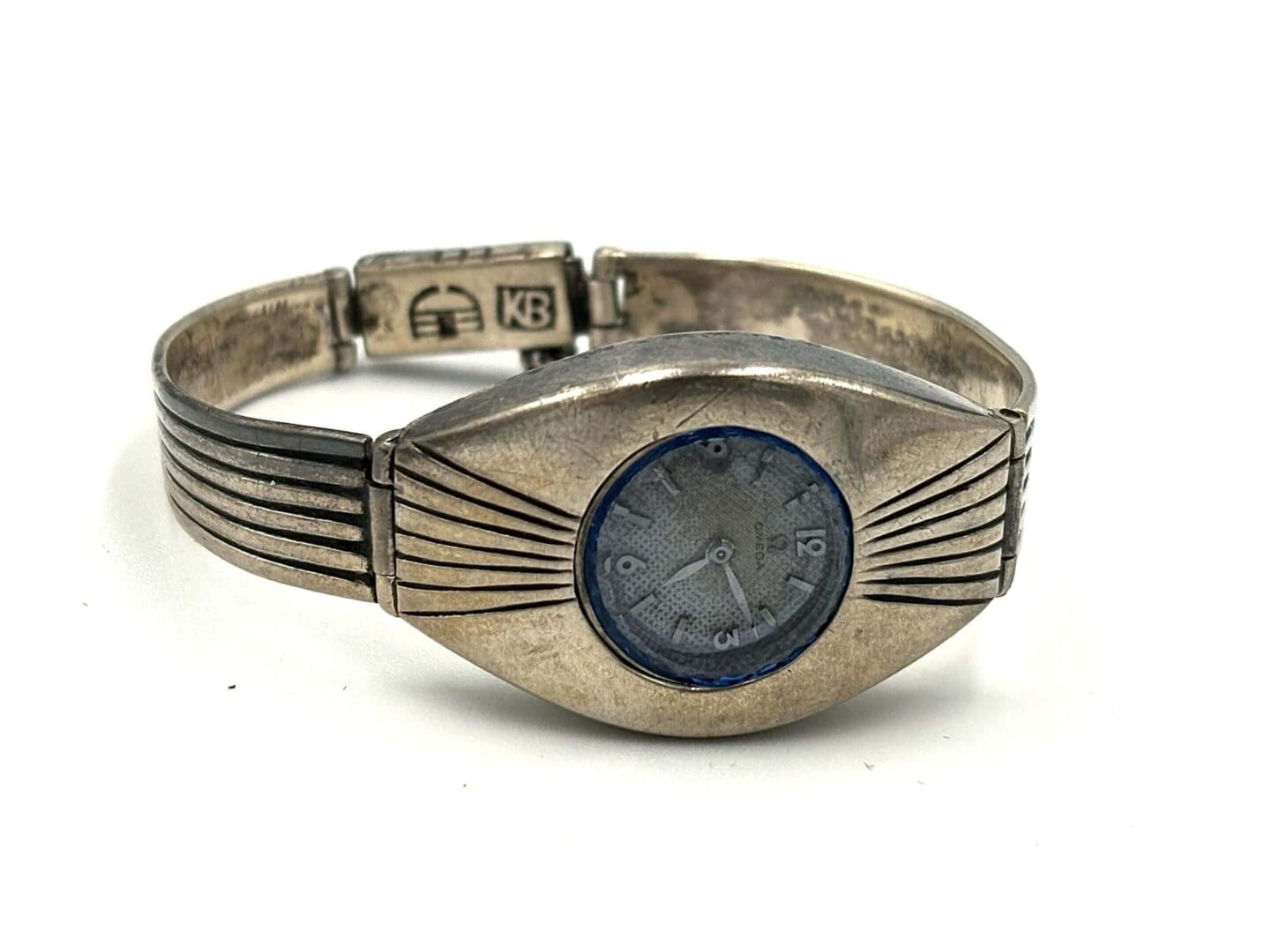 Vintage silver wristwatch with unique design.