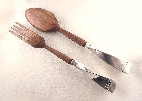 Wooden spoon and fork with metal handles.