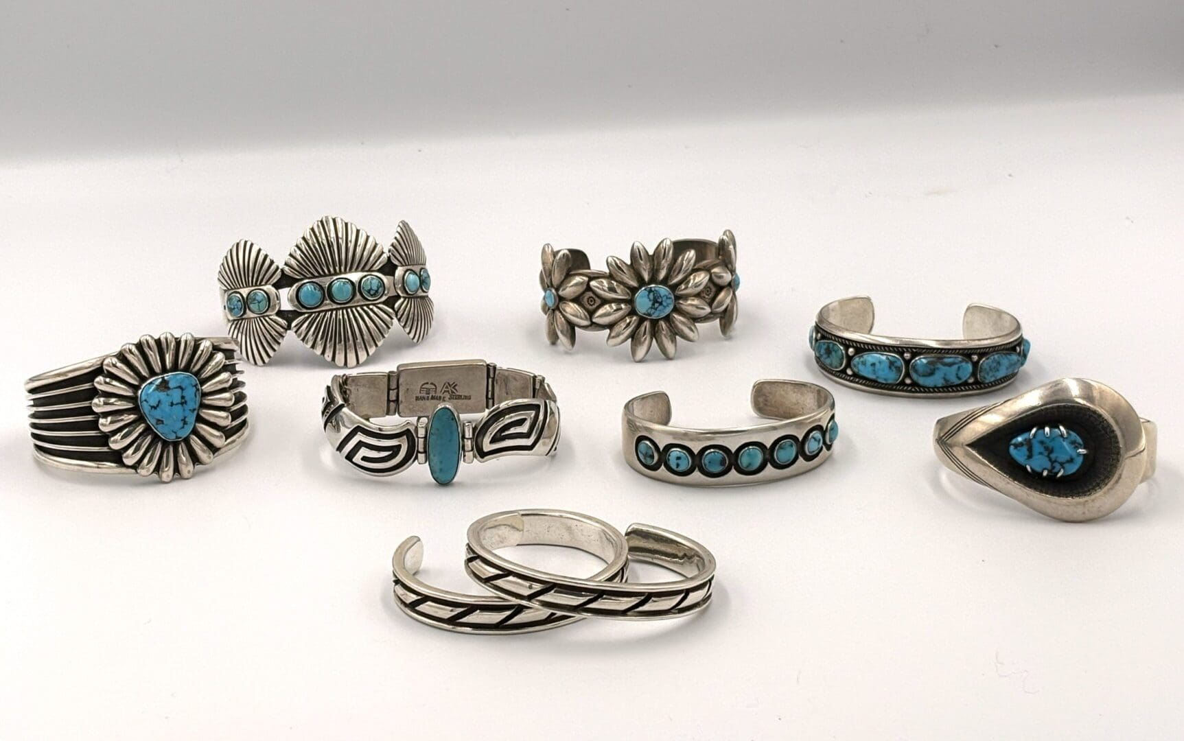 Silver rings with turquoise stone designs.