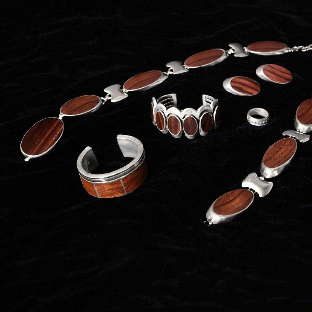 Silver jewelry set with wood accents.