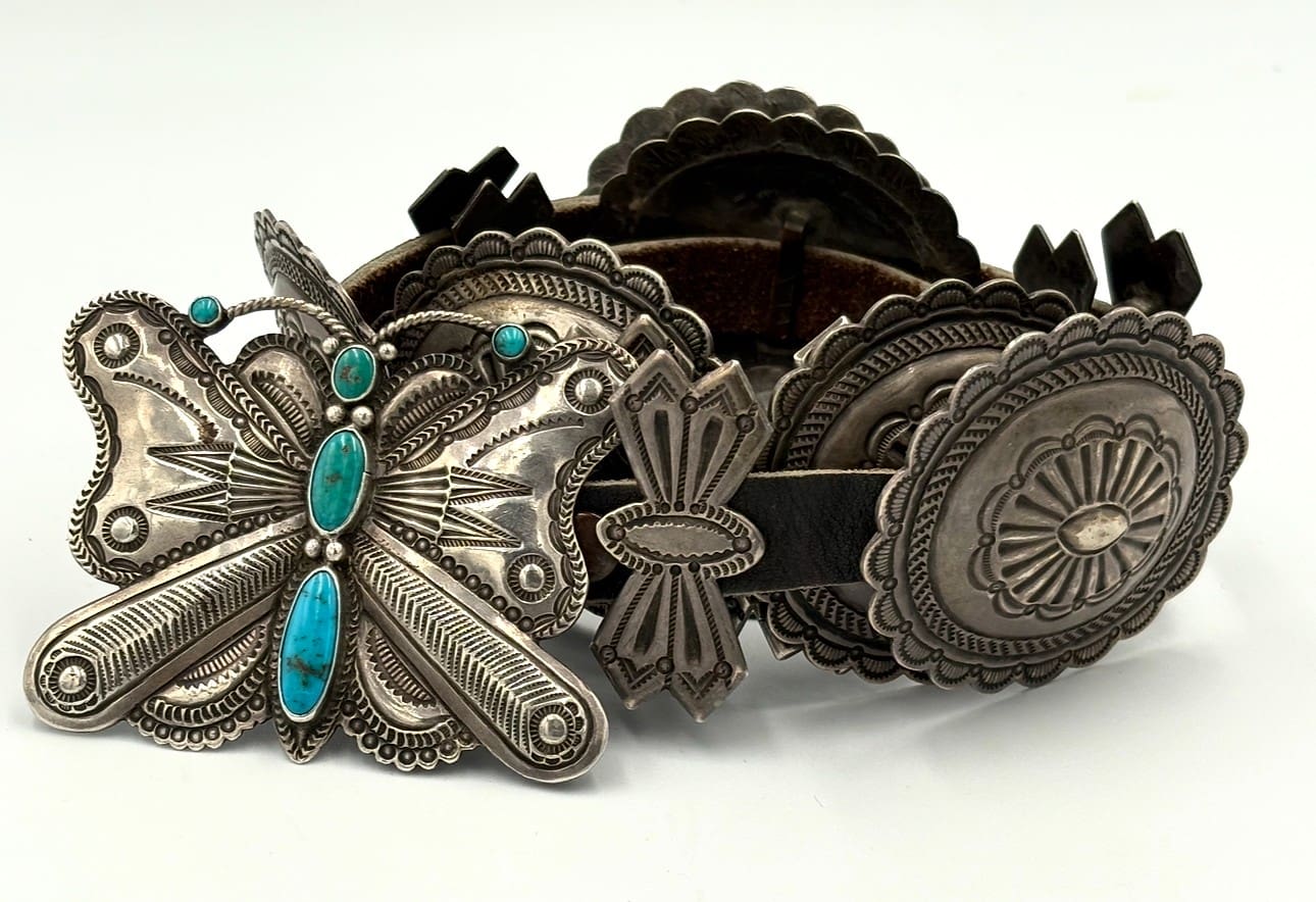 Silver belt with butterfly turquoise buckle.