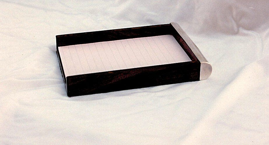 Wooden tray on a white surface.