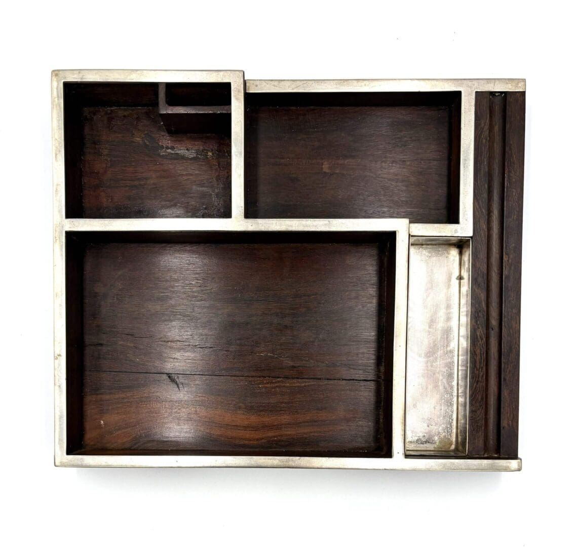 Rectangular wooden tray with metal edges.