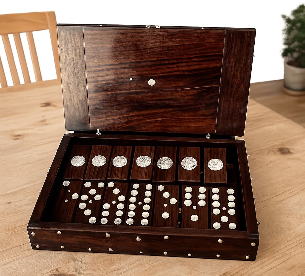 Wooden box with silver coins inside.